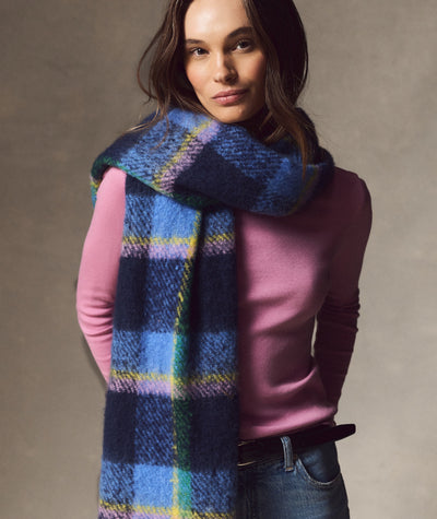 Model wearing a blue and navy plaid Brushed Scarf over a pink long-sleeve top.