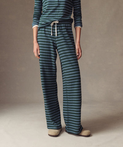 Model wearing Double Knit Wide Leg Pant in dark green and blue stripes with a drawstring waist.