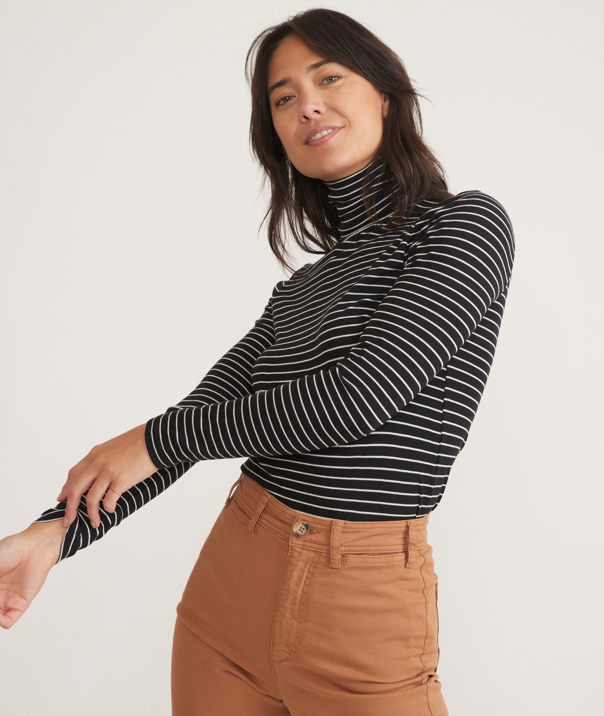 Black and white turtleneck top on sale